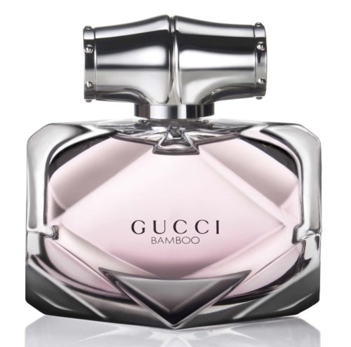 Luxe geurflacon met zilveren dop, gemarkeerd 'GUCCI BAMBOO', roze vloeistof binnenin, elegant en glanzend ontwerp.