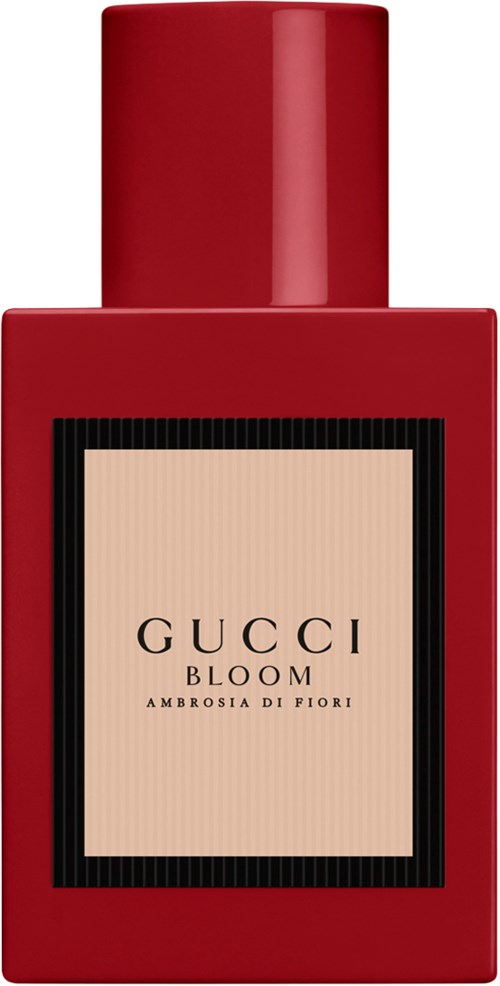 Rode parfumfles met een grote dop, etiket leest 'GUCCI BLOOM Ambrosia di Fiori' in zwarte tekst.