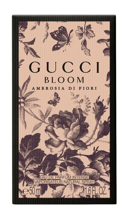 En parfymförpackning med blommönster och fjärilar, visar texten 'GUCCI BLOOM' och 'Ambrosia di Fiori'.