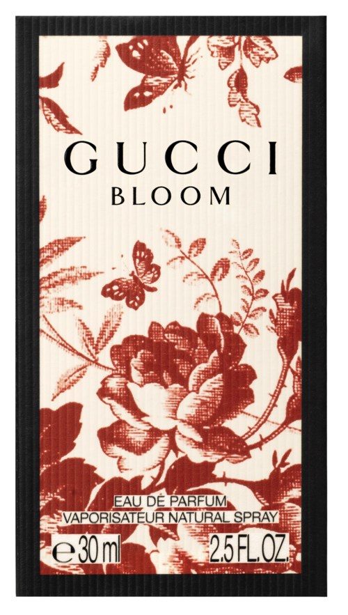 En parfyllflaska med blomsterdesign, kallad Gucci Bloom, som visar volym och spraytyp.