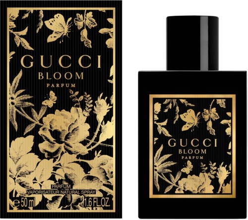 Een zwarte parfumfles en doos met gouden bloemen en vlinderontwerpen, gelabeld 'GUCCI BLOOM PARFUM.'