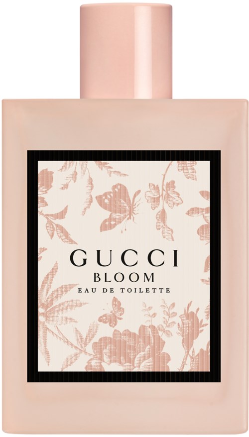 Een lichtroze parfumfles met Gucci Bloom label, bloemenontwerp en zwarte rand op het label.