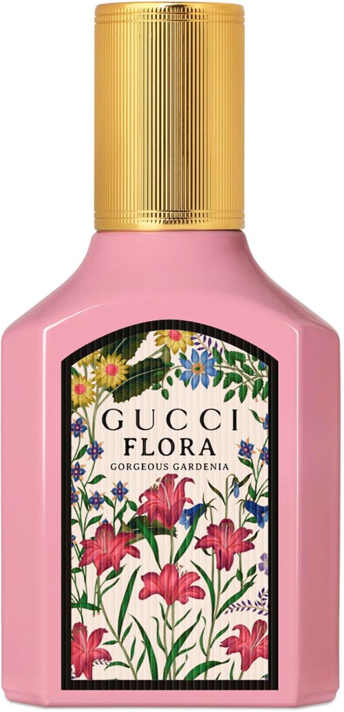 Een roze parfumfles met een gouden dop, gelabeld Gucci Flora Gorgeous Gardenia, versierd met kleurrijke bloemen.