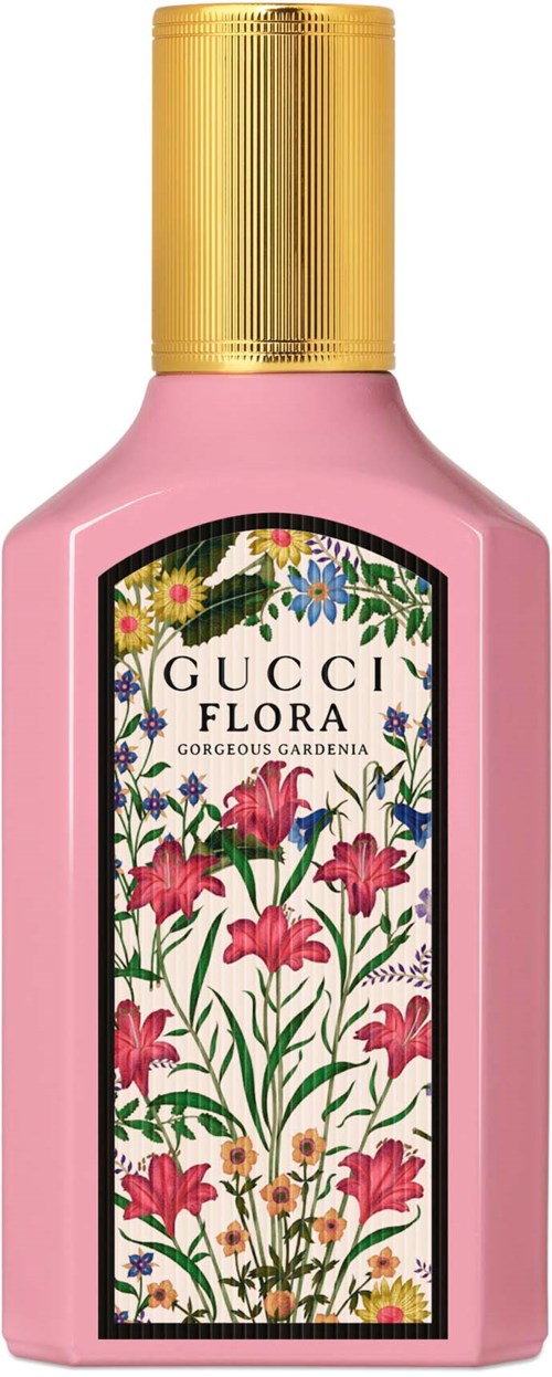 Een roze fles met een label dat 'Gucci Flora' zegt. De dop is goudkleurig. Het label heeft kleurrijke bloemen en bladeren.