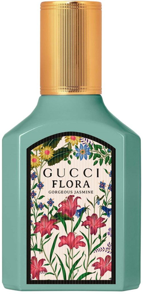 Een fles Gucci Flora geurofene met kleurrijke bloemenillustraties en een gouden dop.