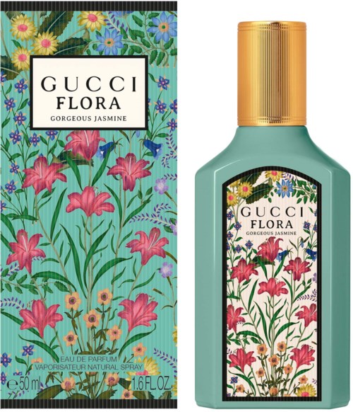 Een parfumfles en doos met kleurrijke bloemen en groen, gelabeld 'Gucci Flora Gorgeous Jasmine'.