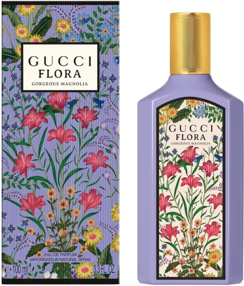 Een fles Gucci Flora-parfums met bloemenontwerp, paarse kleur, gouden dop en bijpassend doosje.