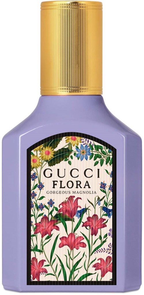 Een paarse parfumfles met een gouden dop en een kleurrijk bloemenlabel dat zegt "GUCCI FLORA."