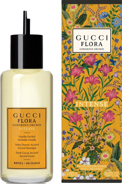En flaske Gucci Flora Intense parfyme med gul etikett og blomsterinspirert eske.