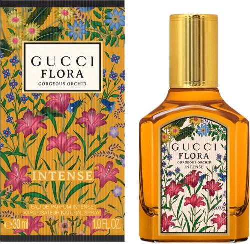 Gucci Flora Gorgeous Orchid Intense parfymeflaske ved siden av fargerik blomsteremballasje.