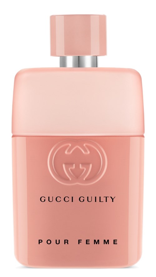 Een roze parfumfles met een zilveren dop, label zegt Gucci Guilty Pour Femme.