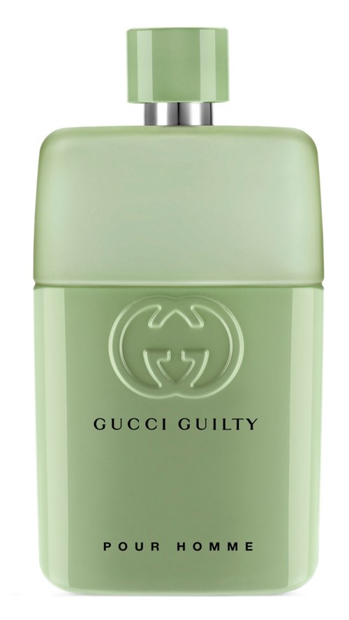 En lys grønn Gucci Guilty Pour Homme parfymeflaske med lokk og logo i midten.