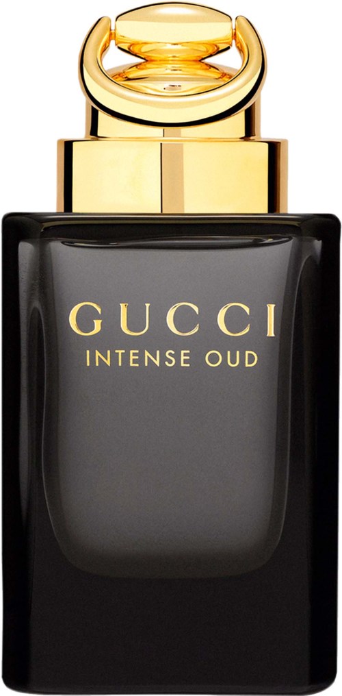Czarna butelka perfum z złotym zakrętką i napisem GUCCI INTENSE OUD.
