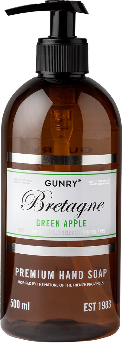 A brown plastic bottle with a pump contains green apple-scented hand soap. The label shows the brand and product details.