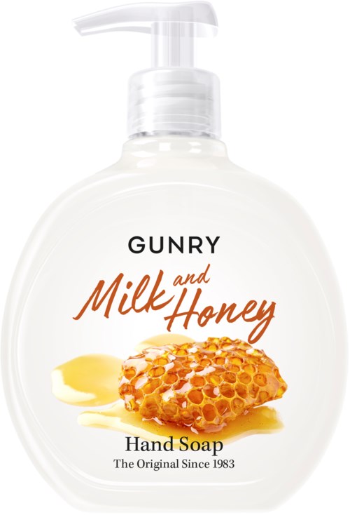 A white hand soap bottle with a pump, labeled "GUNRY Milk and Honey", showing honey and a honeycomb.