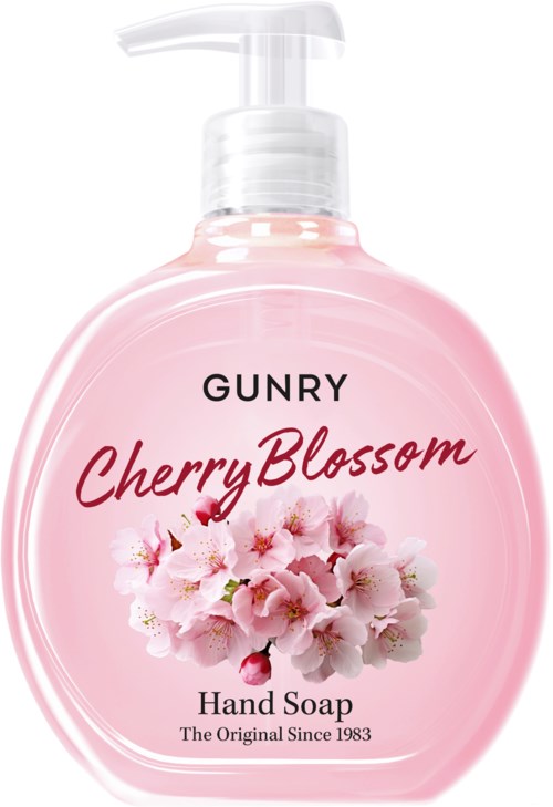 Pink hand soap bottle with cherry blossoms and brand name Gunry on it.