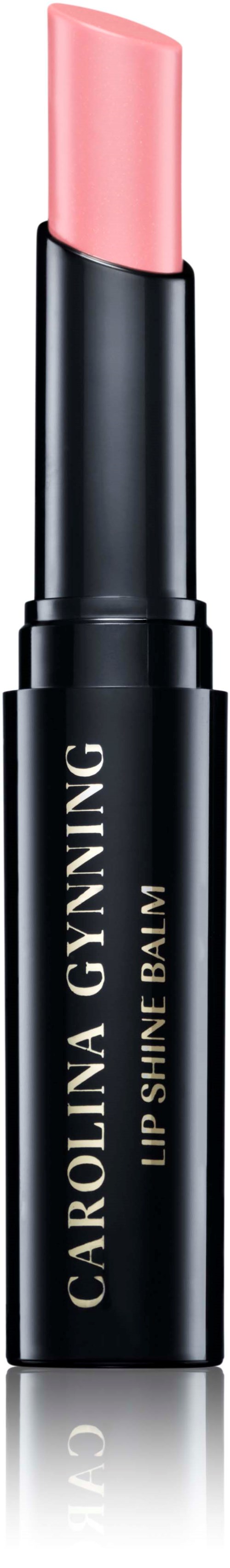 Schwarzer Stick mit rosa Lippenstift, beschriftet 'Carolina Gynning Lip Shine Balm' in Gold.