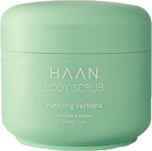 A green round container with a lid, labeled as HAAN body scrub with verbena scent, sulfate free, exfoliates and softens.