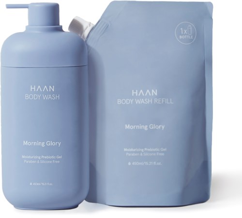 Eine blaue Flasche und Nachfüllpackung für HAAN Duschgel mit Morgen Glory Duft, als feuchtigkeitsspendendes probiotisches Gel gekennzeichnet.
