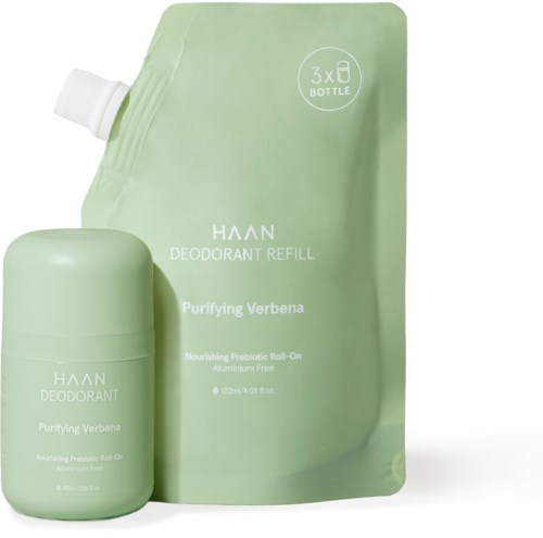 Green bottle and refill pouch labeled 'Haan Deodorant Purifying Verbena,' with a small spray top on the bottle.