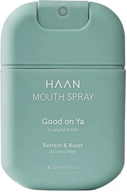 A light green container for mouth spray with white text, indicating flavors and alcohol-free feature.