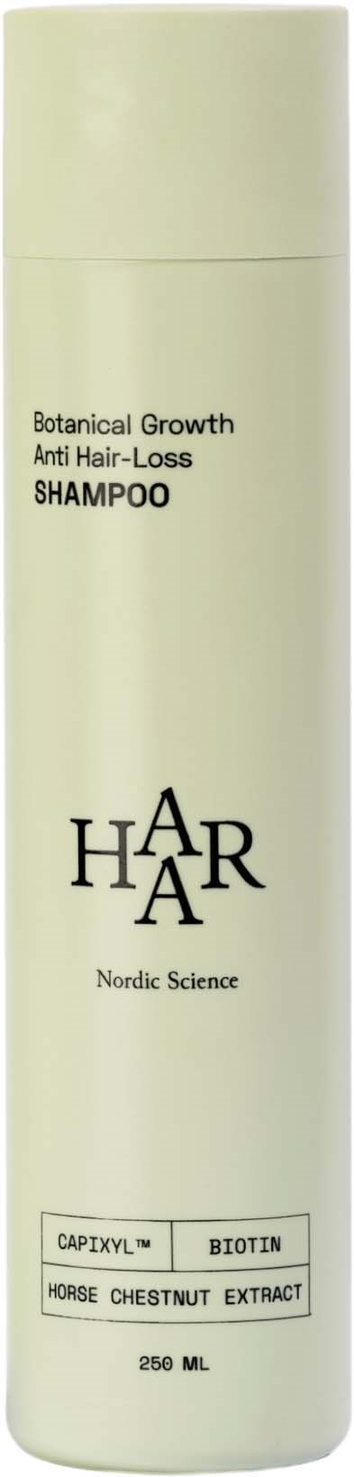 A tall, light-colored shampoo bottle with black text, named 'Har Nordic Science,' for hair growth with natural ingredients.