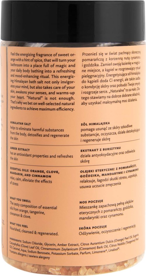 En beholder med etikett, sannsynligvis for en kosmetikk- eller helsetilbehør, har tekst om ingredienser og fordeler.