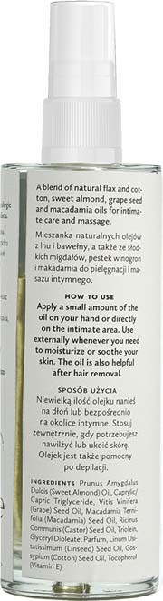 A clear spray bottle with a white cap and detailed label in multiple languages. Contains skincare or cosmetic product.
