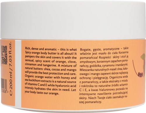 A body butter jar with a label describing orange scent, ingredients like shea butter, mango butter, honey, and orange water.