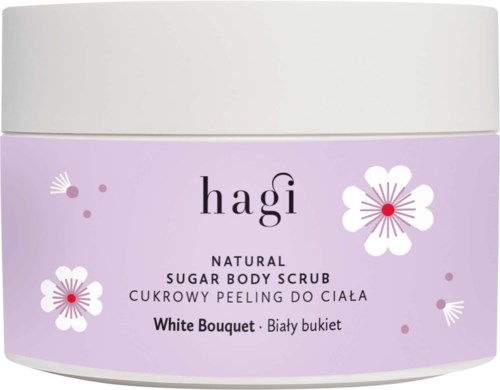 A purple container of Hagi natural sugar body scrub with white flowers and small dots shows product details.