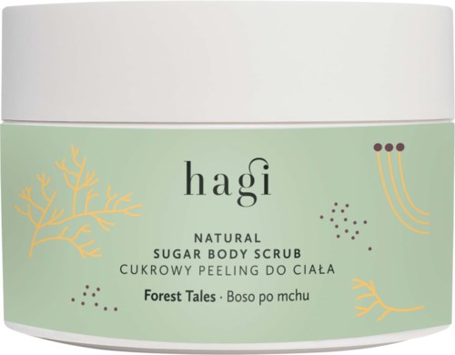 Pieni purkki, jossa lukee 'Hagi Natural Sugar Body Scrub Forest Tales' ja koristeellisia kasvikuvia vaalean vihreällä taustalla.