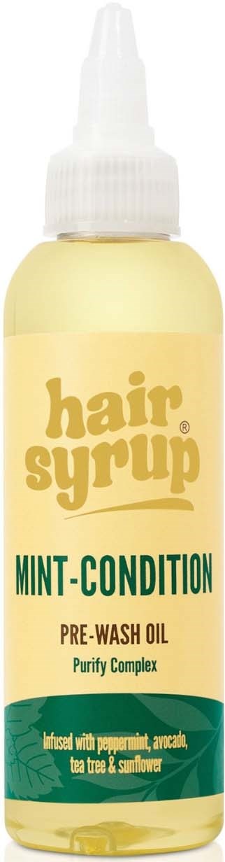 Flesje haarserum met mint-condition-label, bevat pre-wash olie en natuurlijke ingrediënten zoals pepermunt en aloë.