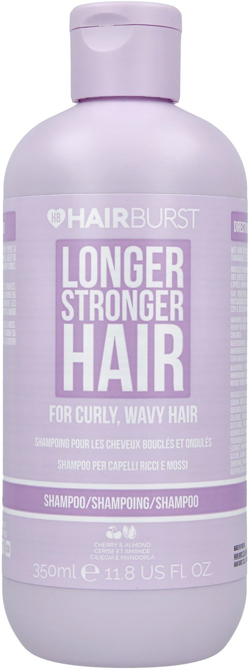 Een lavendelkleurige fles Hairburst shampoo voor krullend, golvend haar dat langer, sterker haar belooft. Het heeft een groot label.