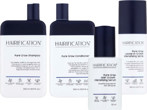 Neljä hiustenhoitotuotetta: shampoo, hoitoaine, seerumi ja hoitoaineenhoitoaine tummissa pulloissa, valkoisilla etiketeillä.
