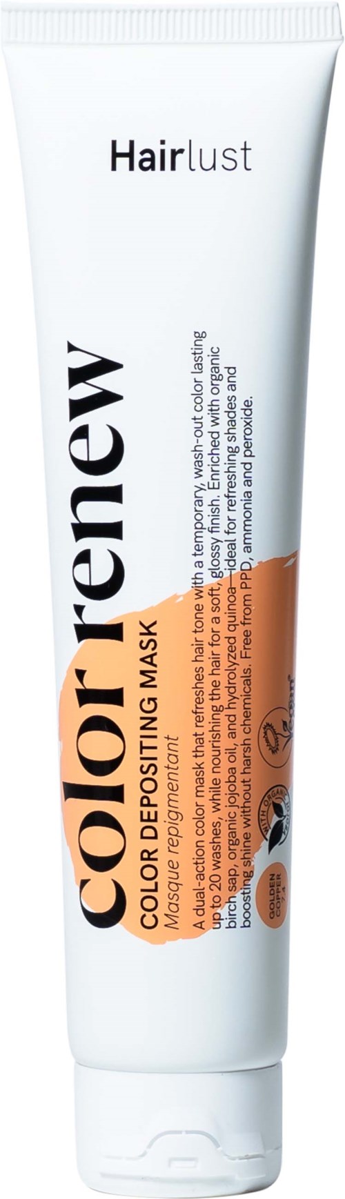 Hvit Tube med oransje og svart etikett, produkt for fargebevarende og reparerende håreinngjøring.