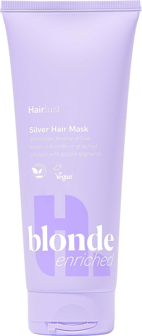 Lilla lavendelfarget shampoo-flaske med etikett som sier Blonde Enriched, Hair Mask og vegansymbol.