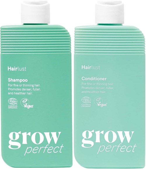 Two light green bottles with white caps, labeled Hairlust Grow Perfect shampoo and conditioner, for fine, thinning hair.