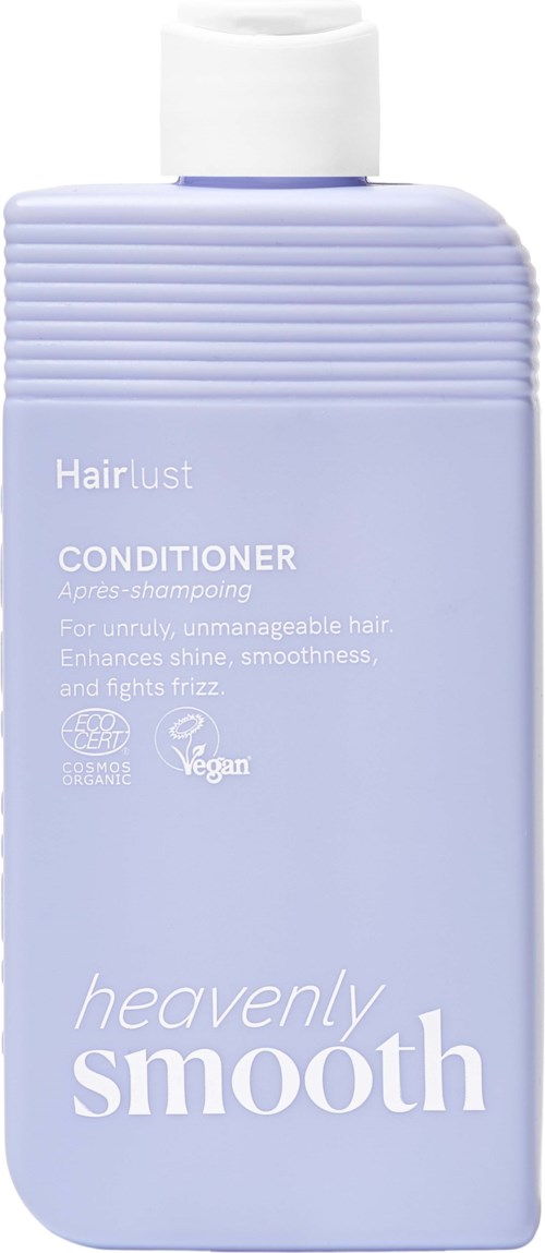 Light purple bottle of hair conditioner with a white cap, labeled Heavenly Smooth, designed for frizz control and shine.