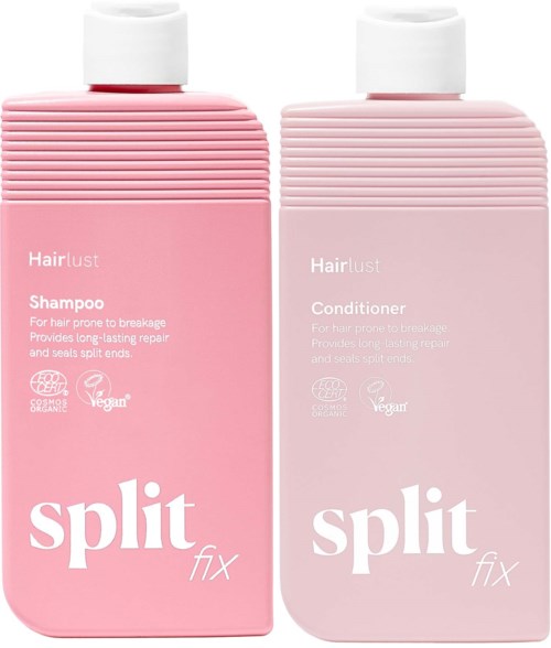 To rosa sjampo- og balsamflasker fra Hair Lust, med ribbede lokk og hvite etiketter som viser produktnavn og fordeler.
