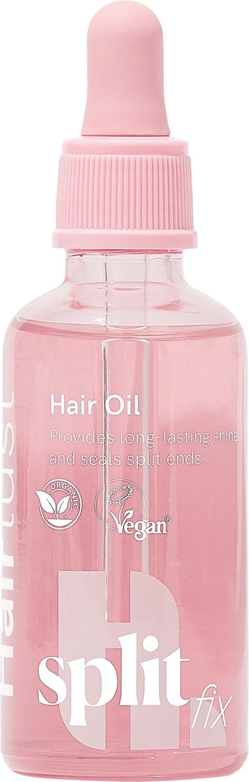 En liten rosa flaske med dråpetut, merket Split Fix Hair Oil, vegansk og passer for alle hårtyper.