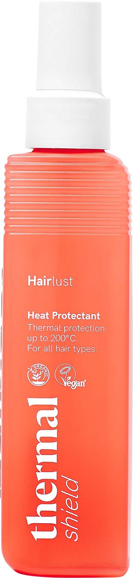 En korallfärgad flaska med vit spraykapsel, märkt Hairlust Thermal Shield Heat Protectant för alla hårtyper.