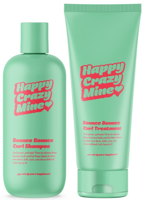 Zwei grüne Haarpflegeflaschen mit rosa Text, gekennzeichnet als Shampoo und Lockenbehandlung, genannt "Happy Crazy Mine."