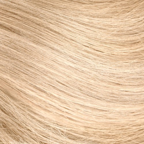 Close-up of smooth, blonde hair strands showing detail and texture.