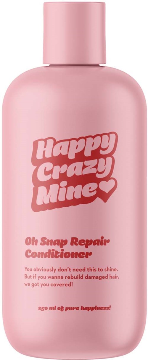 Roze fles met 'Happy Crazy Mine' voor 'Oh Snap Repair Conditioner', gericht op het herstellen van beschadigd haar.