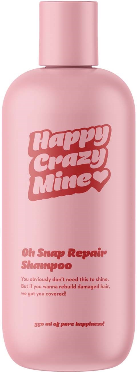 Een roze shampoo-fles met de woorden 'Happy Crazy Mine' en details over haarherstel en geluk.