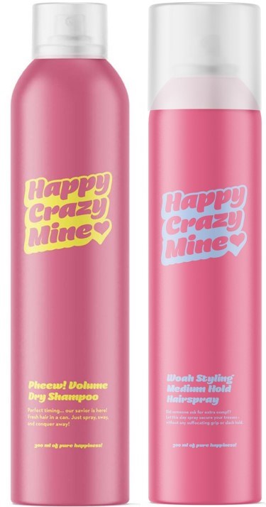 Twee roze flessen met gele en roze labels, waarop staat "Happy Crazy Mine" en beschrijving van shampoo en haar spray.
