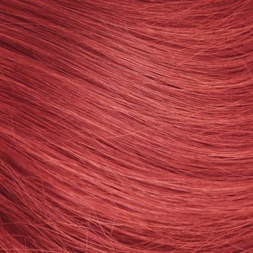 Close-up of pink hair, showing fine strands and shiny texture.
