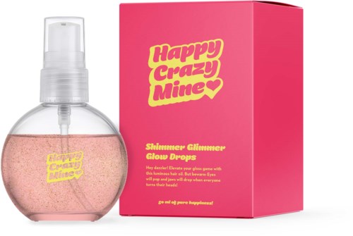 Rosa glitterglödande flaska med en rosa låda märkt Happy Crazy Mine och Shine Glitter Glow Drops.