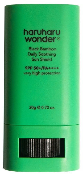 A green tube with black text for Haruharu Wonder sunscreen, SPF 50+, with a black sliding cover.