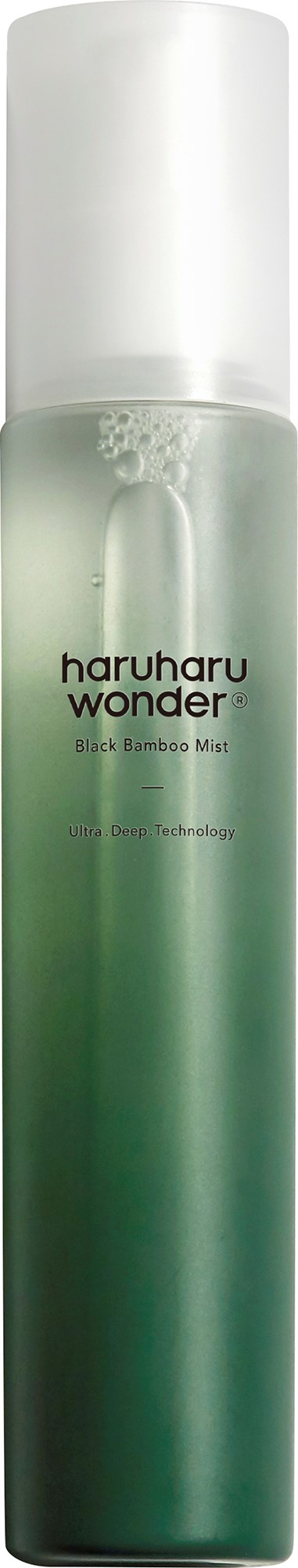 A tall, green spray bottle with a white cap, labeled 'haruharu wonder Black Bamboo Mist'.